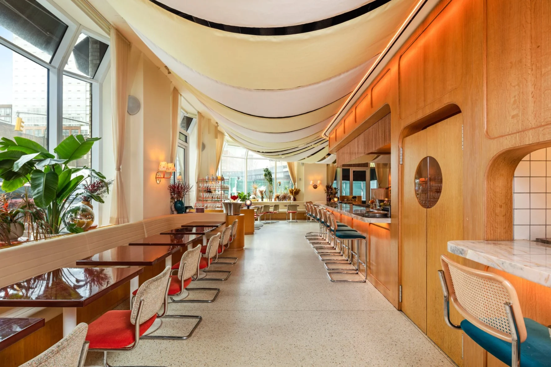 Curved timber wall and joinery at Cucina Alba
