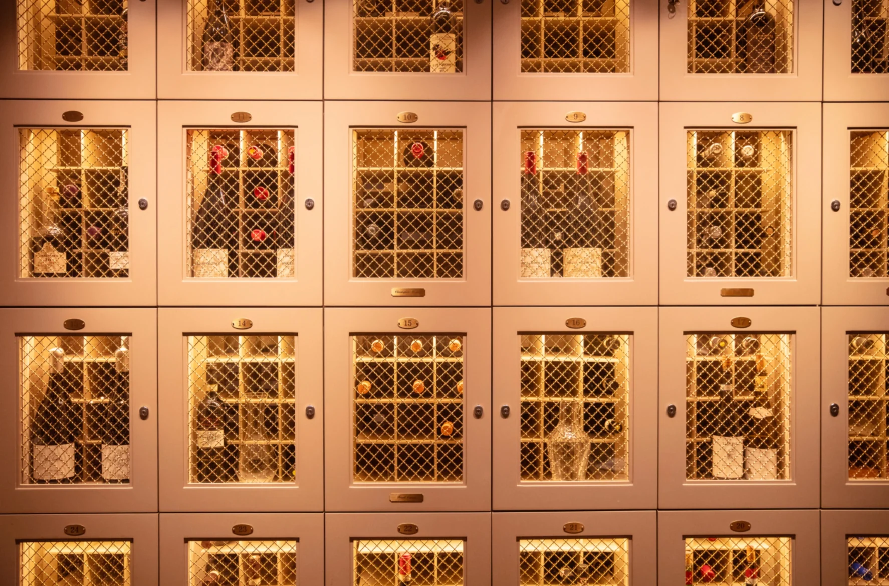 Precisely detailed timber wine cabinets at Sartiano’s